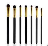 Black handle gold tube